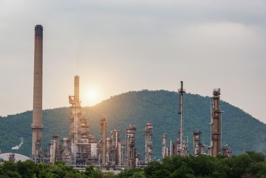 Oil Refinery factory Petroleum in sunset at twilight, petrochemical plant