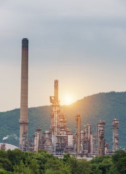 Oil Refinery factory Petroleum in sunset at twilight, petrochemical plant