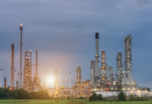 Oil Refinery factory Petroleum at twilight sunset, petrochemical plant