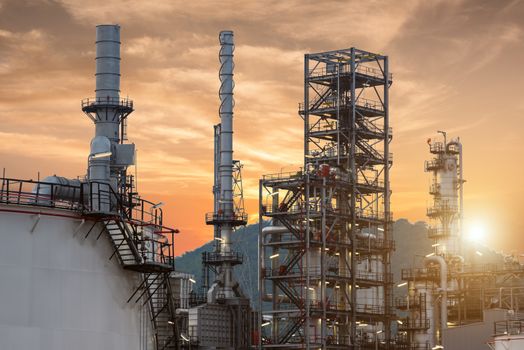 Oil Refinery factory Petroleum at twilight sunset, petrochemical plant