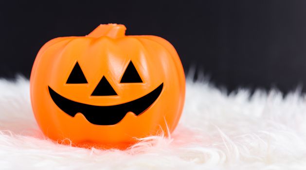 Pumpkin Jack creepy in Halloween day concept on black background