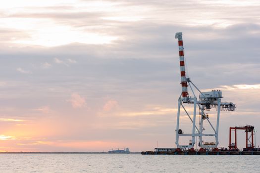 Industrial Container Cargo freight ship with working crane bridge