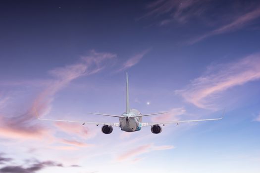 Airplane aft plane in the sky at sunset sky