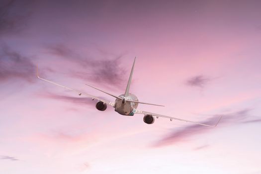 Airplane aft plane in the sky at sunset sky