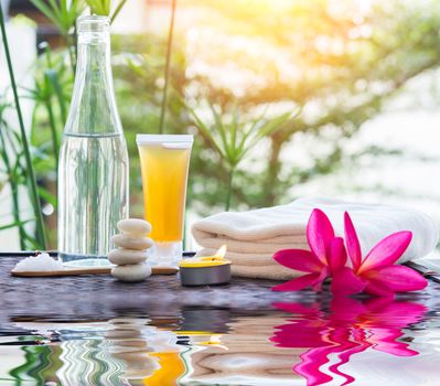 zen Spa treatment with water Reflections on nature a background