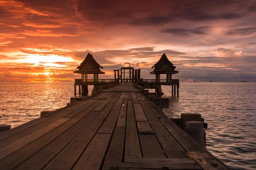 Twilight sunset wood bridge at Djittabhawan Temple tourist attraction in Pattaya, Thailand