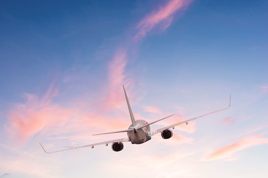 Airplane aft plane in the sky at sunset sky