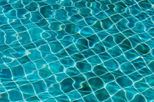 Blue swimming pool water texture reflection lighting