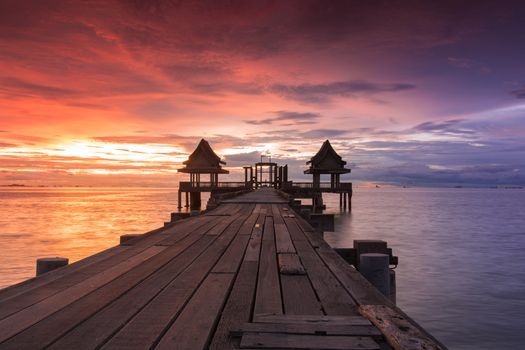 Twilight sunset wood bridge at Djittabhawan Temple tourist attraction in Pattaya, Thailand