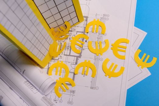 Paper skyscrapers , euro money, house projects plan and blueprints on blue background paper. Minimalistic and simple concept, style. Horizontal orientation. View from above.