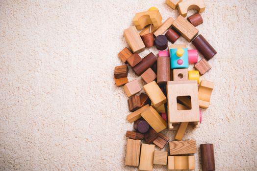 Building playing toy blocks wood for baby education with copy space