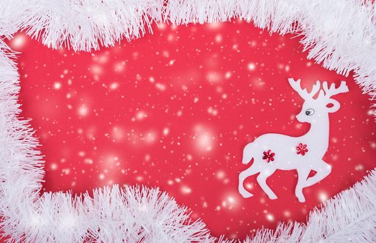 Reindeer decoration in christmas holiday on red background