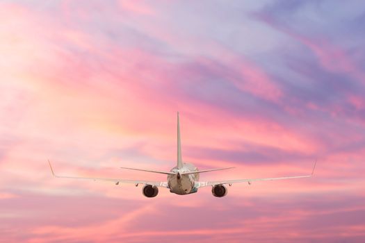 Airplane aft plane in the sky at sunset sky