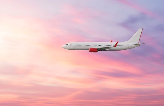 Airplane plane in the sky at sunset sky