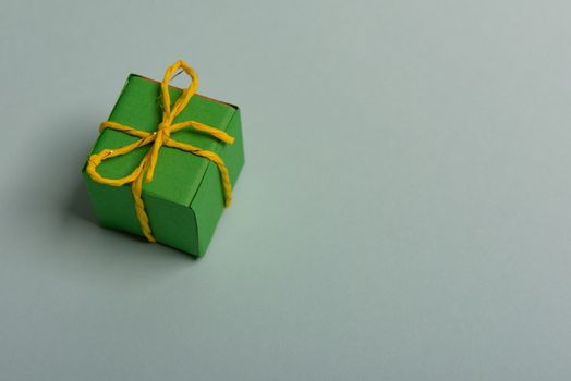 christmas presents nicely decorated with bows and feathers. view from above