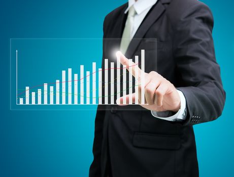 Businessman standing posture hand touch graph finance isolated on over blue background