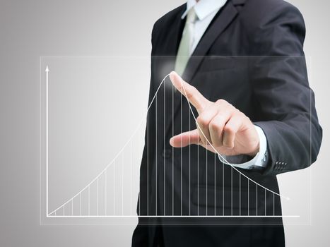 Businessman standing posture hand touch graph finance isolated on over gray background