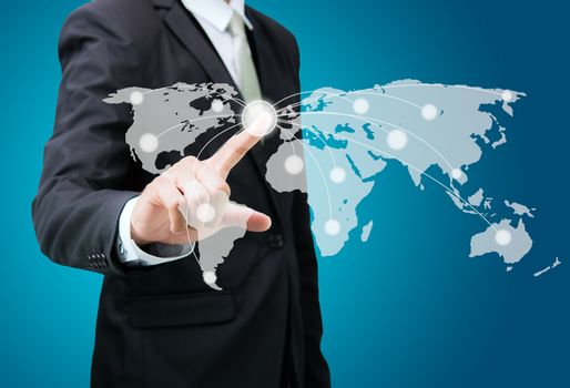 Businessman standing posture hand touch Earth icon isolated on over blue background
