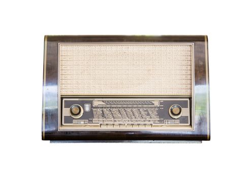 Old radio receiver of the last century isolate on over white background