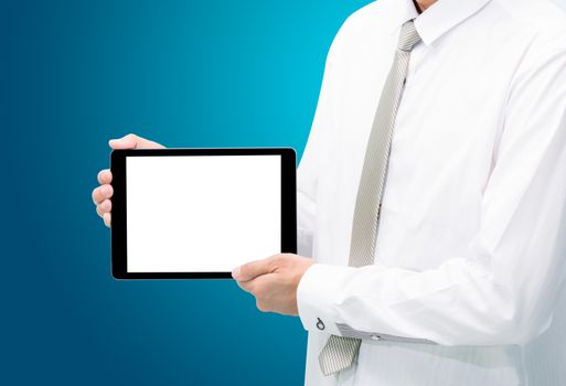 Businessman standing posture hand holding blank tablet isolated on blue background