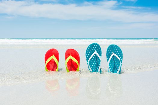 Beach, slippers on tropical beach in holiday at Thailand