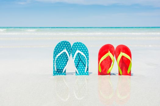 Beach, slippers on tropical beach in holiday at Thailand