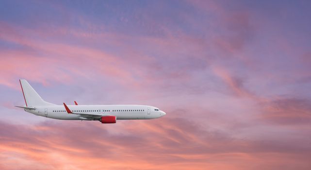 Airplane plane in the sky at sunset sky