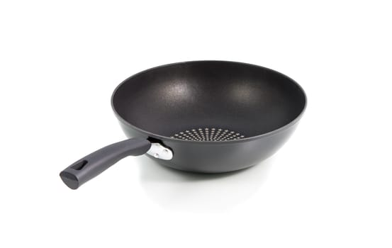 Closeup black frying pan isolated on over white background