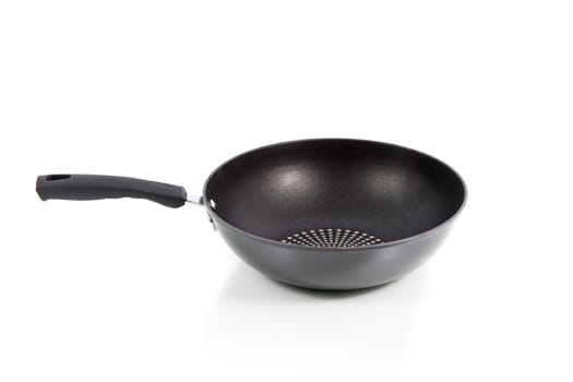 Closeup black frying pan isolated on over white background