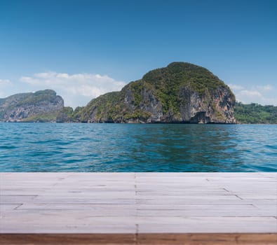 Wood table top or flooring on the beach background, can you use for display your products