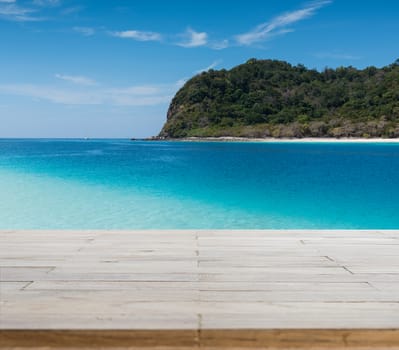 Wood table top or flooring on the beach background, can you use for display your products