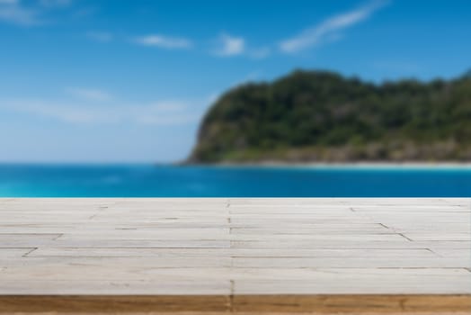 Wood table top or flooring on the beach background, can you use for display your products
