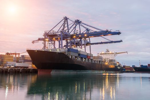 Industrial Container Cargo freight ship with working crane bridge
