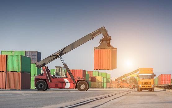 Forklift handling container box loading at the Docks with Truck