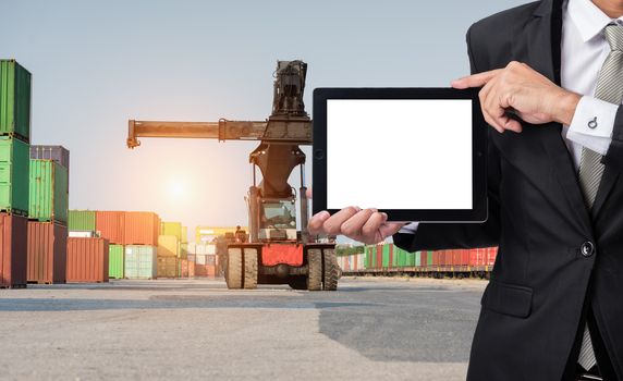 Foreman or working man hold tablet control loading Containers box to Logistic cargo Import Export Background