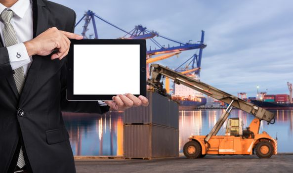 Foreman or working man hold tablet control loading Containers box to Logistic cargo Import Export Background