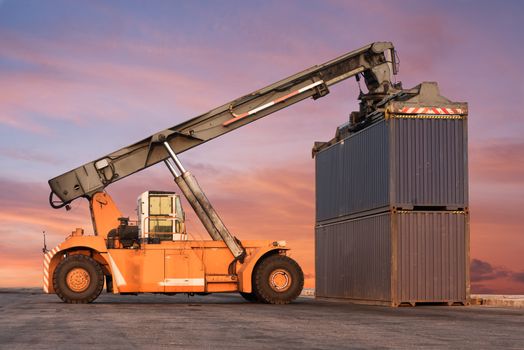 Forklift handling container box loading at the Docks with Truck