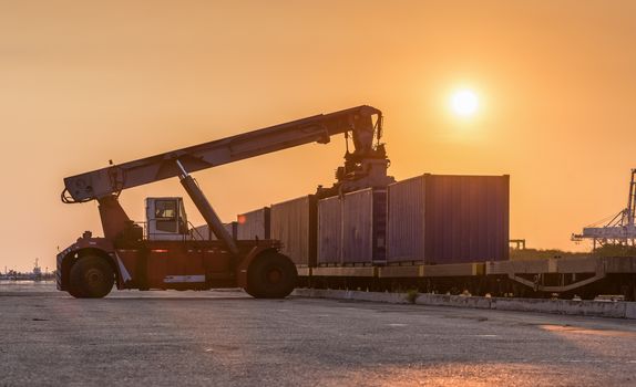 Forklift handling container box loading at the Docks to Truck