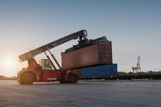 forklift handling holding container box at harbor logistic zone