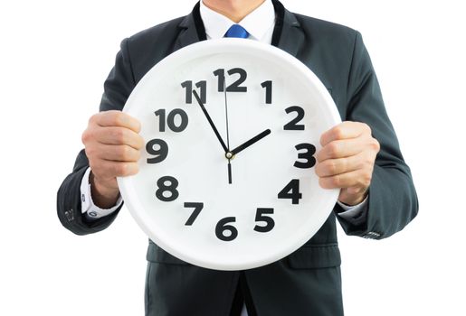 White clock holding in businessman hands isolated on over white background