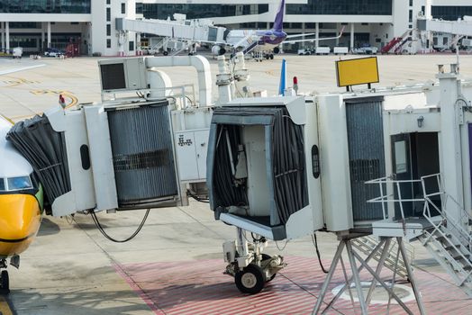 Cabin of plane with gate way passengers arrive on airport