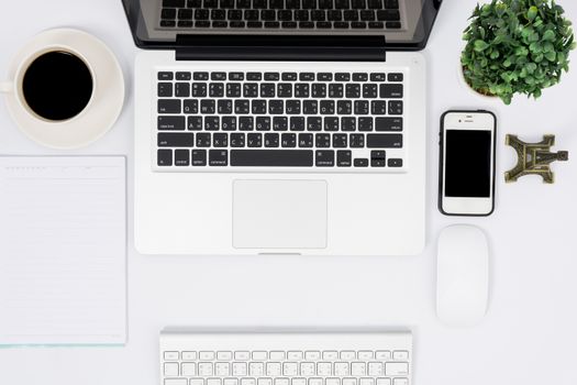 Top view laptop or notebook workspace office on white table