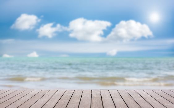 Beach Scene With Wooden Floor background can put or montage your products