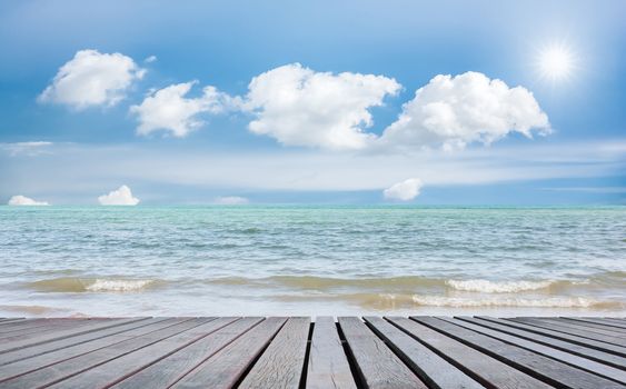Beach Scene With Wooden Floor background can put or montage your products