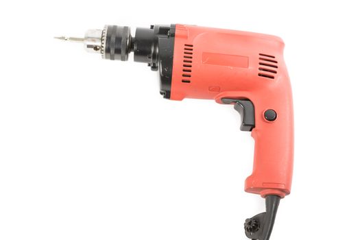 Orange drill machine isolated on over white background