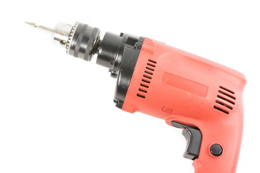 Orange drill machine isolated on over white background