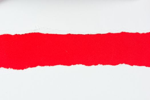 tear red paper pieces of paper on white background