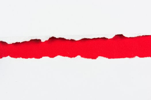 tear red paper pieces of paper on white background