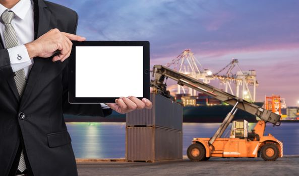 Foreman or working man hold tablet control loading Containers box to Logistic cargo Import Export Background