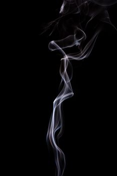 Abstract incense smoke isolated on black background